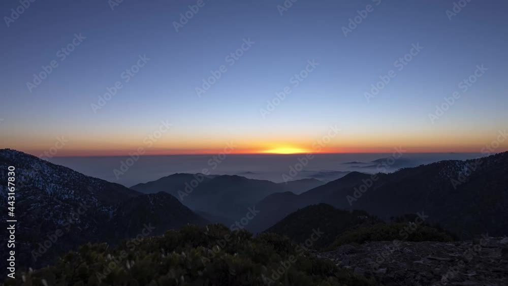 Time-lapse of mountains at sunset Time-lapse of mountains at sunset