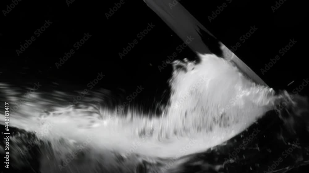 Water Splash swirl In Black background Water Splash swirl In Black background