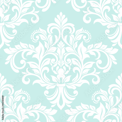 Damask seamless vector background. Wallpaper in the baroque style template. Blue and white floral element. Graphic ornate pattern for wallpaper  fabric  packaging  wrapping. Damask flower ornament.
