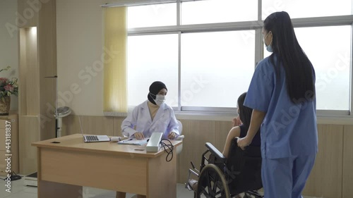 patient on wheelchair pushed to nurse