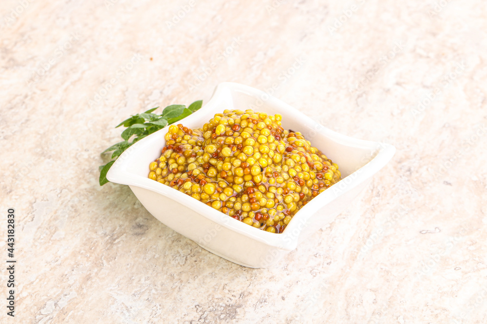 Grain mustard sauce in the bowl