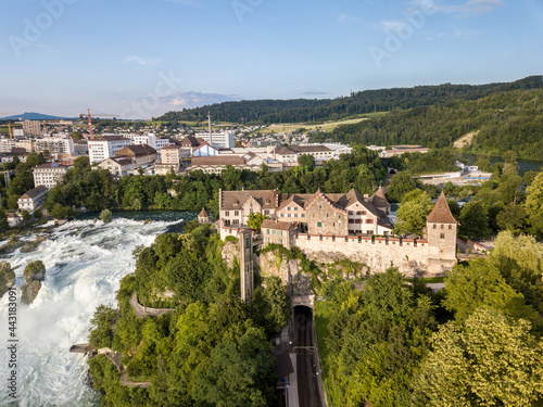 Aerial image with drone over the Rhine Falls and Castle Laufen in Switzerland - the largest waterfall in Europe