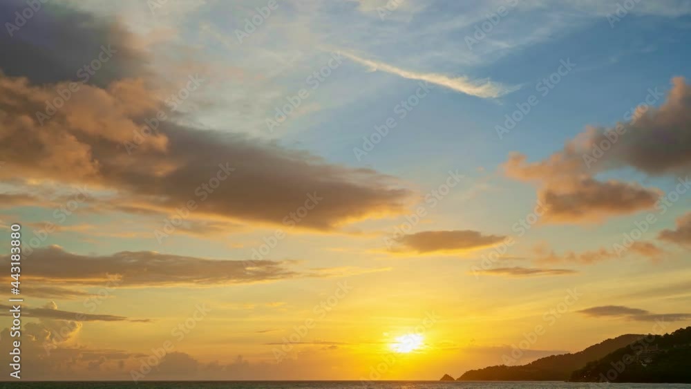 Amazing landscape light of nature majestic clouds in Sunset or Sunrise sky over sea Beautiful light reflection on sea surface Burning golden sky and shining colorful waves flowing in dramatic sky Amazing landscape light of nature majestic clouds in Sunset or Sunrise sky over sea Beautiful light reflection on sea surface Burning golden sky and shining colorful waves flowing in dramatic sky
