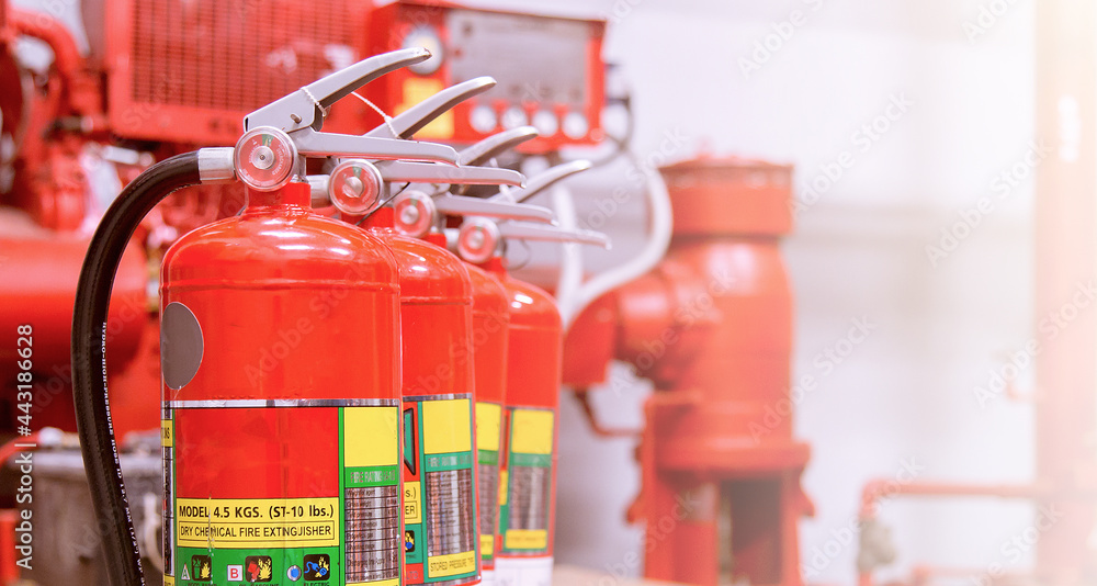 Red tank of fire extinguisher Overview of a powerful industrial fire extinguishing system. Red tank of fire extinguisher Overview of a powerful industrial fire extinguishing system.