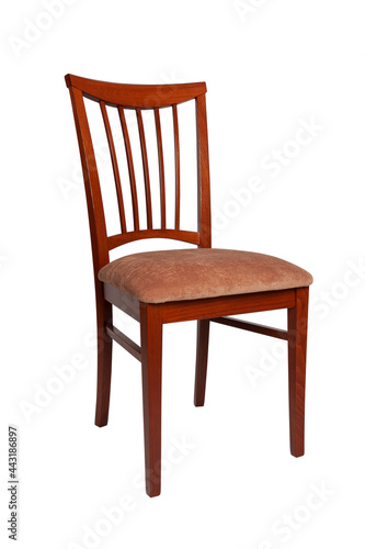 Brown wooden chair with plain brown fabric upholstery. Half-turn view. Isolated on white background.