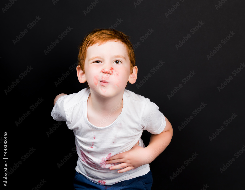 a boy whose face is smeared a boy whose face is smeared