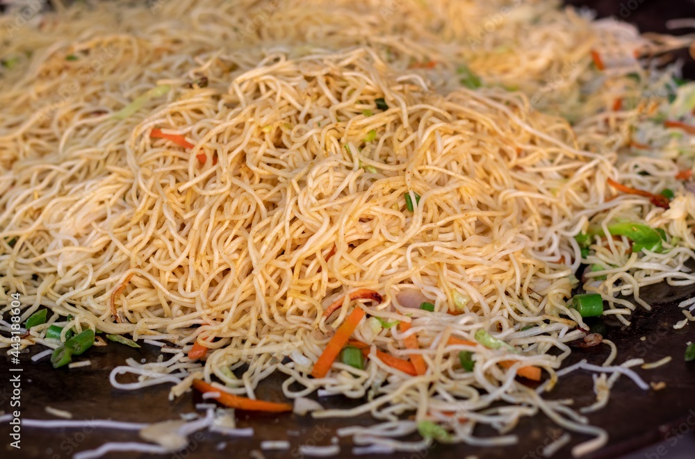 Closeup of Chow Mein on Frying Pan While Making With Selective Focus