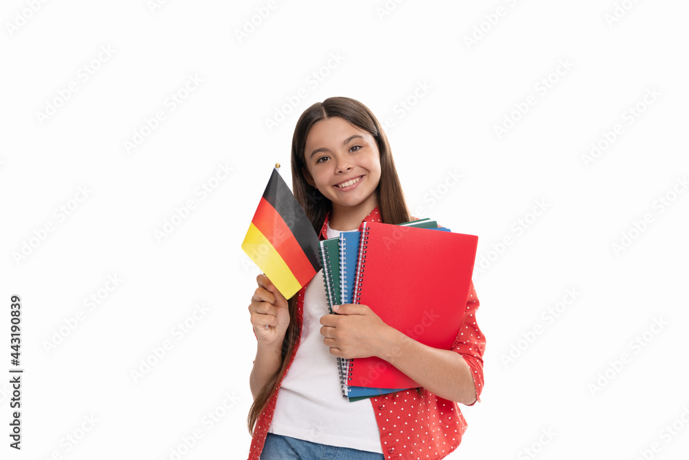 happy kid hold german flag and school copybook for studying isolated on white, foreign language happy kid hold german flag and school copybook for studying isolated on white, foreign language