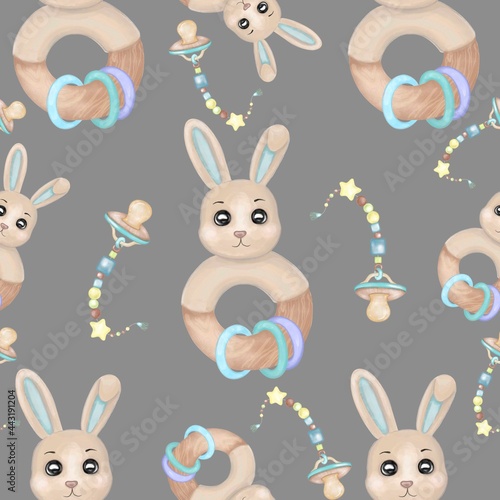 Fototapeta Naklejka Na Ścianę i Meble -  Newborn decorative nipple and rabbit rattle toy seamless pattern. Hand drawn watercolor cute kid's accessories seamless pattern on grey background. Design for a baby textile, clothes, wallpapers.