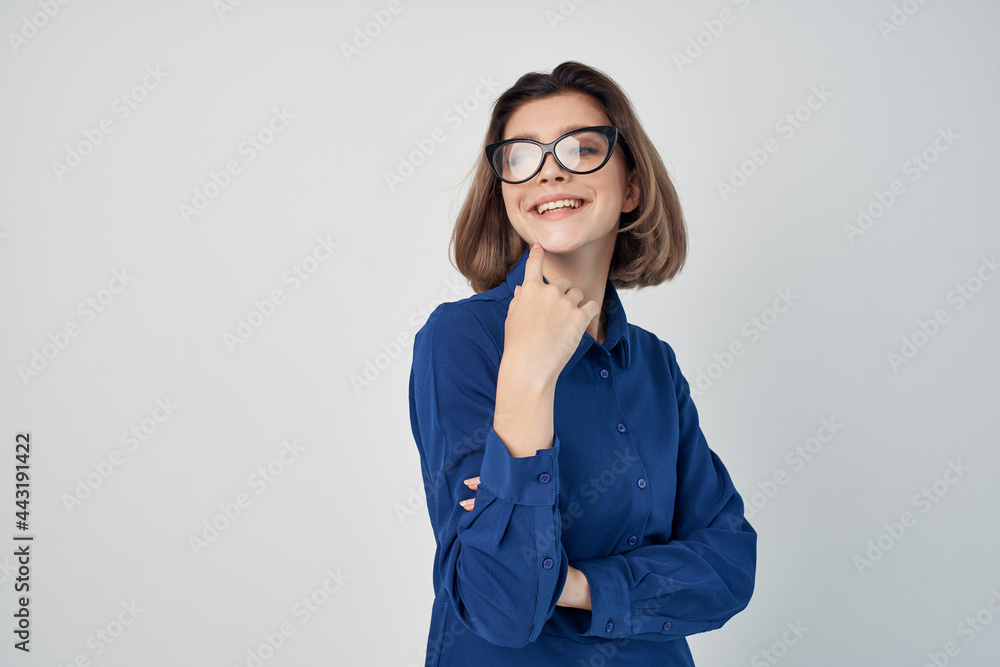 Business woman in blue shirt office official isolated background Business woman in blue shirt office official isolated background