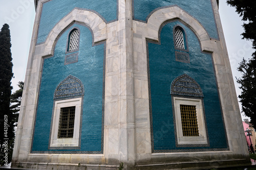 29.03.2021. Bursa Turkey. Green tomb (Yesil Turbe) with iznik pottery (cini) or tiles covered tomb wall. windows of the tomb established by early stage of ottoman empire