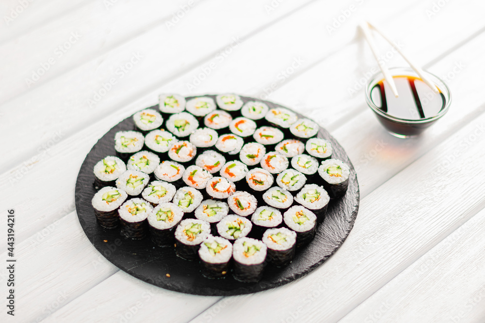 Sushi rolls on black board Sushi rolls on black board