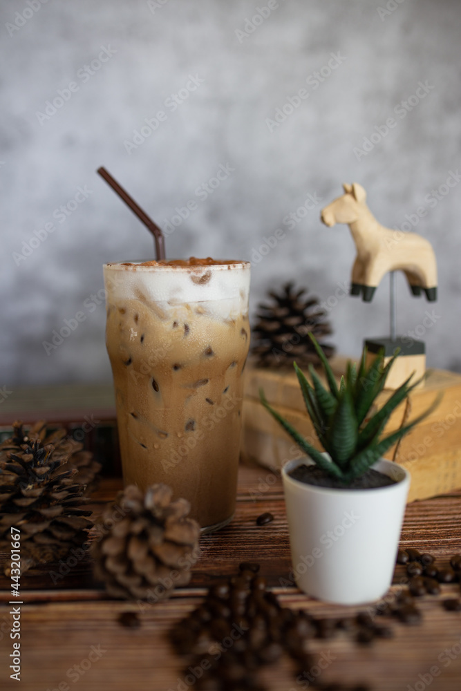 Nice looking coffee on a wooden table The background is a polished wall. beautifully arranged Suitable for making coffee shop menus. Nice looking coffee on a wooden table The background is a polished wall. beautifully arranged Suitable for making coffee shop menus.