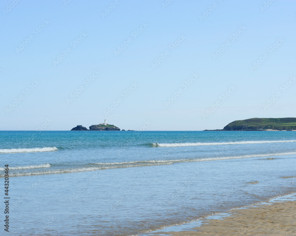 Hayle beach sea and Godrevy Lighthouse Cornwall Hayle beach sea and Godrevy Lighthouse Cornwall