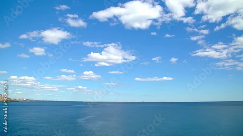 Wallpaper Mural Blue sea and white cloudscape in blue sky, time-lapse Torontodigital.ca