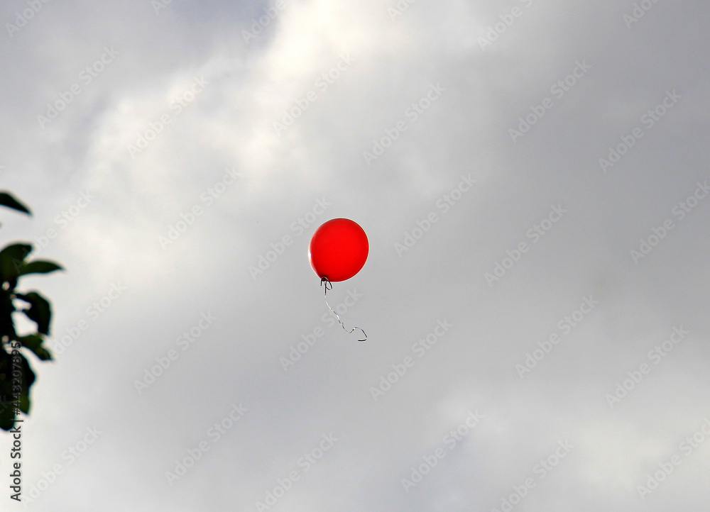balloon that has escaped to freedom soars in the stormy sky balloon that has escaped to freedom soars in the stormy sky