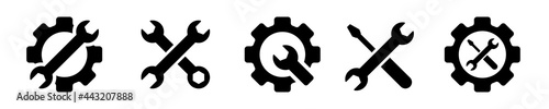 Mechanical gear icon with wrench in the middle for repair on white background. Setting icons set. Stock vector element.	