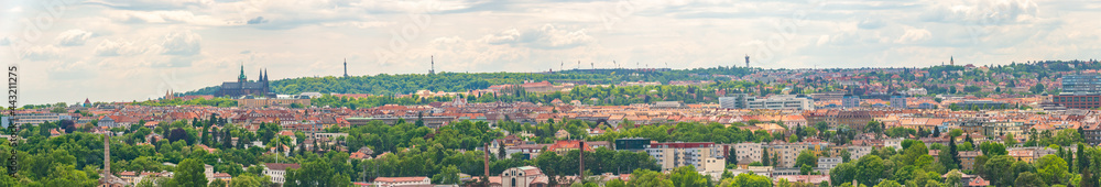 Panoramic view over beautiful old town with Saint Vitus Cathedral in historical downtown of Prague, Czech Republic.