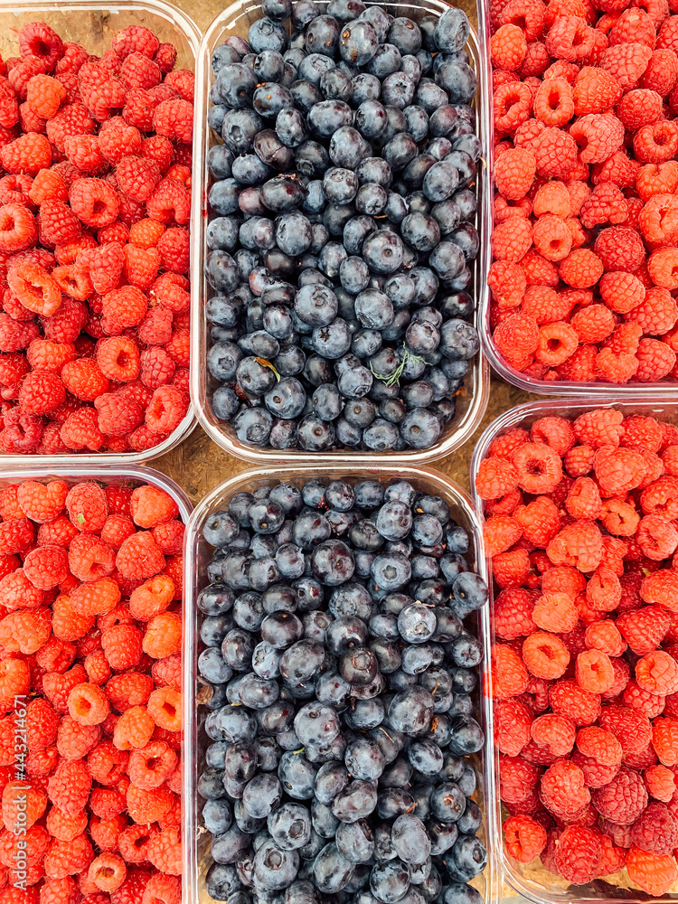lots of sweet ripe raspberry blueberries for eating lots of sweet ripe raspberry blueberries for eating