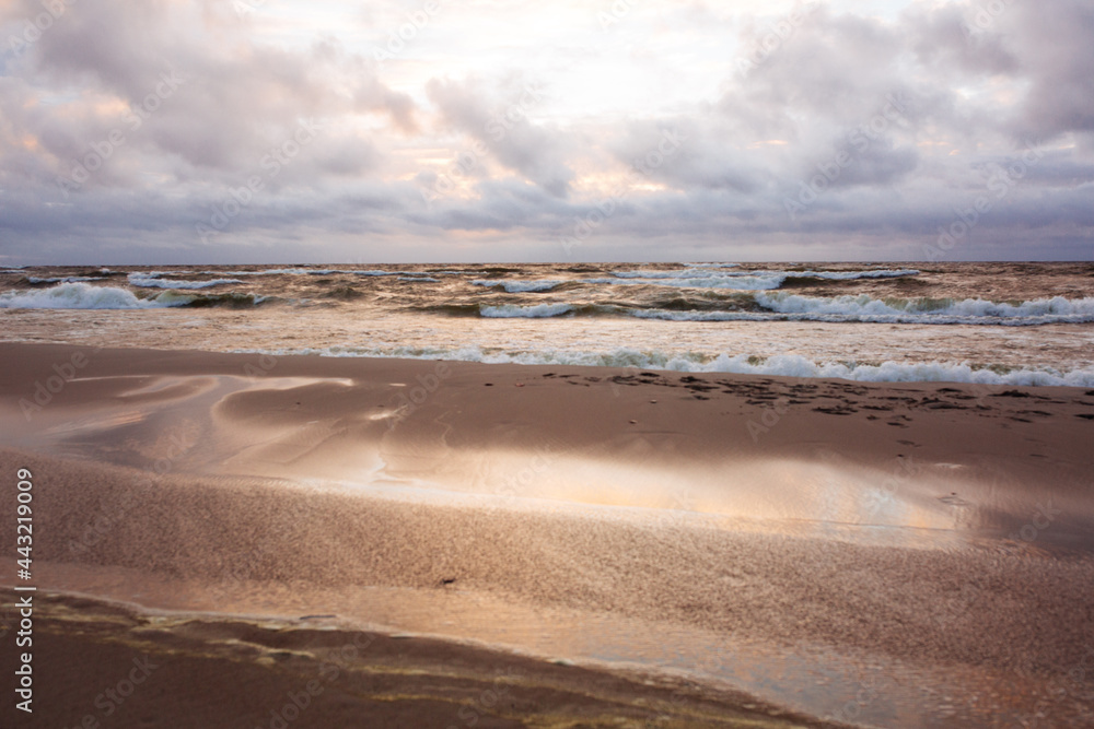sunset by the sea, beautiful summer landscape with clouds and sandy beach sunset by the sea, beautiful summer landscape with clouds and sandy beach