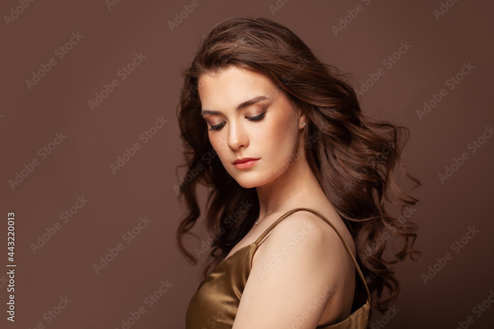 Beauty romantic portrait of perfect beautiful woman with long curly brown hair