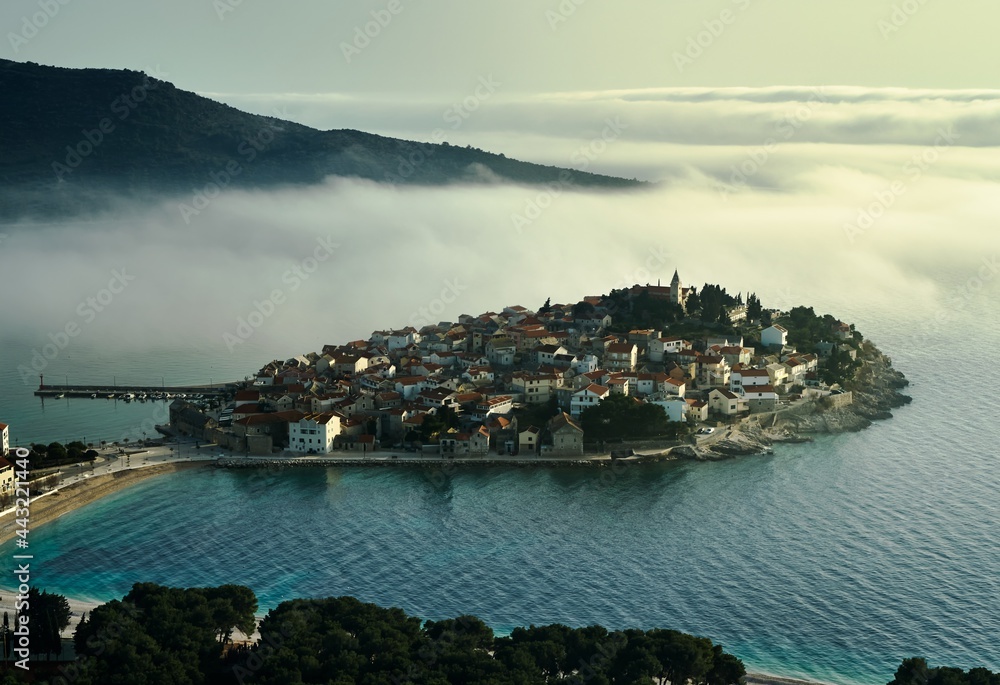 Primosten, seascape at sunset - Croatia, Adriatic sea, Dalmatia, Europe. Drone photo, clouds, mystical.