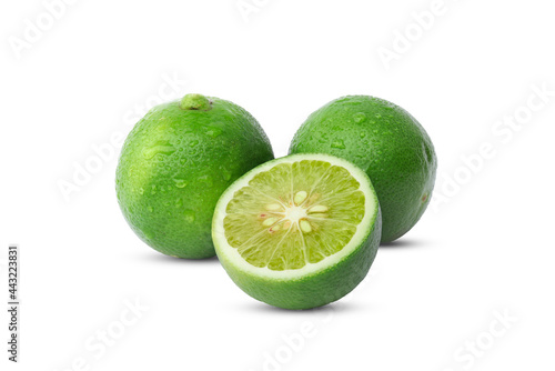 Isolated lime. Natural fresh lime with slices isolated on white background.