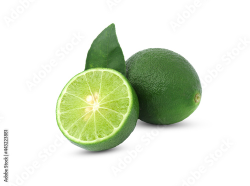 Isolated lime. Natural fresh lime with slices isolated on white background.