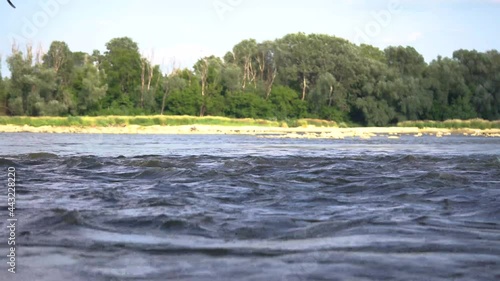 flow of the river over which seagulls fly. Concept: fast, impetuous, stormy