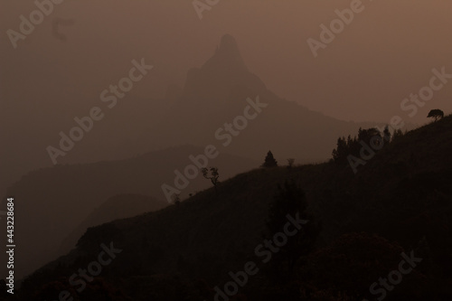 View of rangaswamy peek in kodanadu in the early morning and clouds passing top of the peek