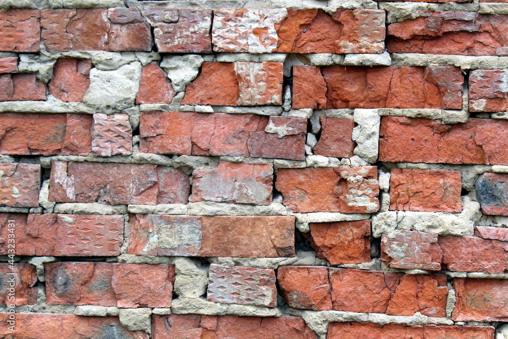 Obraz premium Wall texture of old red dilapidated brick