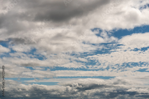 Cloudy cloud on a blue sky. Nature background.