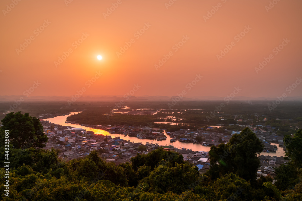 Pak Nam Chumphon town, fisherman village, and river from Khao Matsee scenic viewpoint during sunset, Thailand