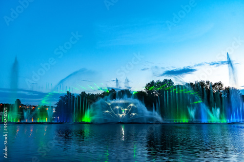 Musical fountain with laser animations. photo