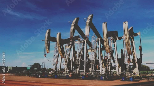 Oil extracting by pump jack in the oil field