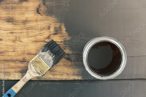 Paint brush on wooden board