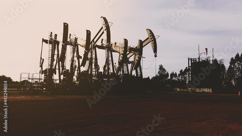 Oil extracting by pump jack in the oil field