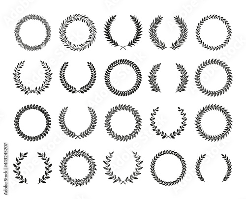 Wreath circle. Black laurel crest with branches and leaves. Peace and award circular floral symbol. Decorative heraldry plant signs collection. Isolated triumph badge. Vector icons set