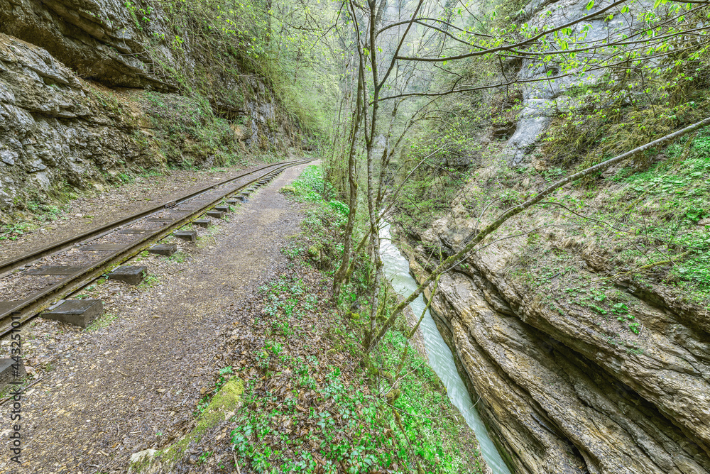 Narrow gauge railway in the deep narrow Guam canyon. Western Caucasus. Narrow gauge railway in the deep narrow Guam canyon. Western Caucasus.