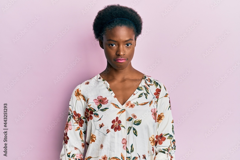 Young african american girl wearing casual clothes depressed and worry for distress, crying angry and afraid. sad expression. Young african american girl wearing casual clothes depressed and worry for distress, crying angry and afraid. sad expression.