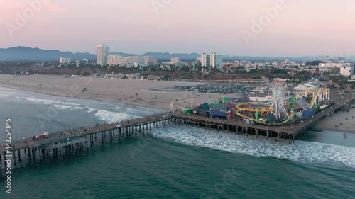 Aerial: Santa Monica Pier at sunset, Los Angeles, California, USA photo