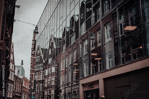 Glas facade buildings in Amsterdam city © Anna
