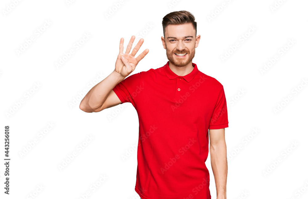 Young redhead man wearing casual clothes showing and pointing up with fingers number four while smiling confident and happy. Young redhead man wearing casual clothes showing and pointing up with fingers number four while smiling confident and happy.