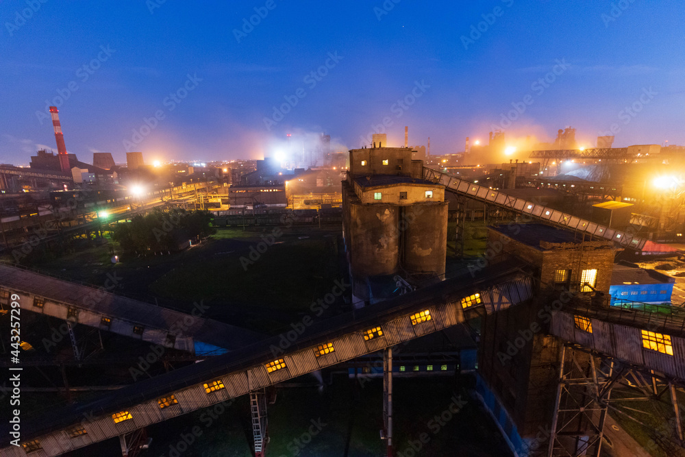 Fototapeta premium factory worker lights at night