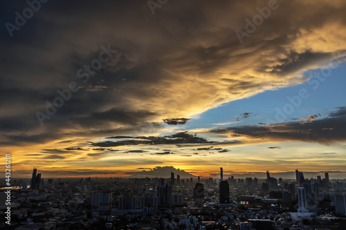 Bangkok, thailand - Jul 02, 2021 : Aerial view of Beautiful sunset over large metropol city in Asia. With tall building and skyscraper in background. Selective focus.