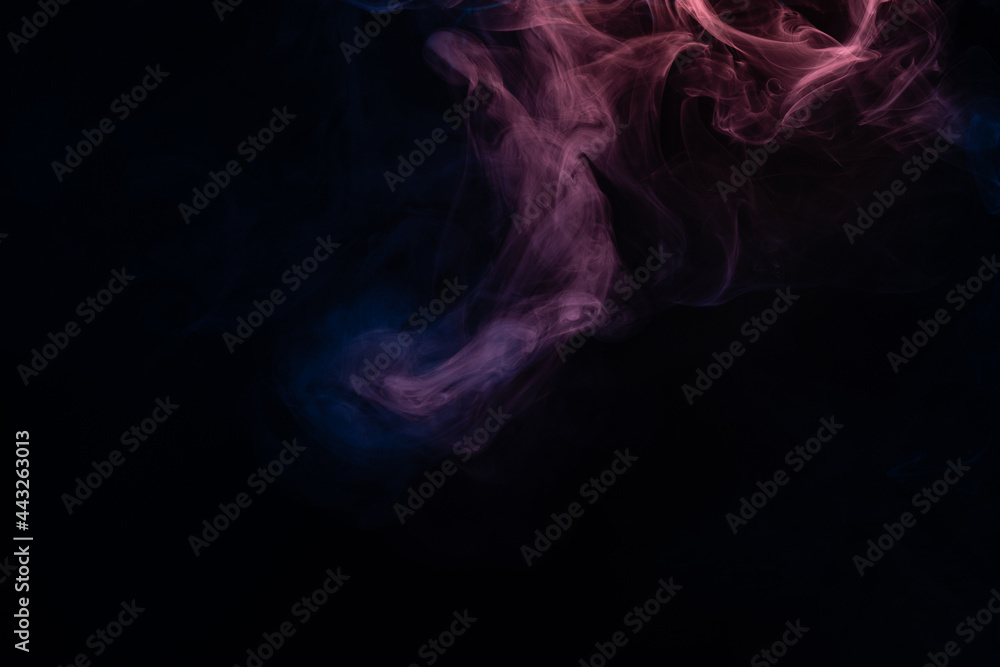 Blue and pink steam on a black background. Blue and pink steam on a black background.