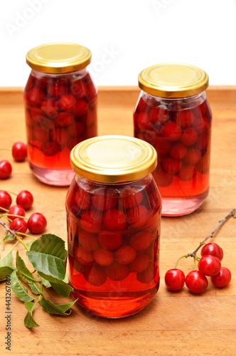 Cherry compote, sour cherries compote, jar of fruit.
