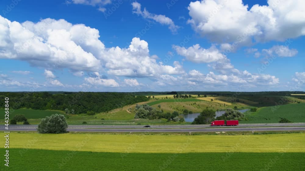 The highway outside the city in the summer aerial view The highway outside the city in the summer aerial view