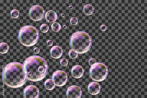 Flying transparent soap bubbles on checkered background.