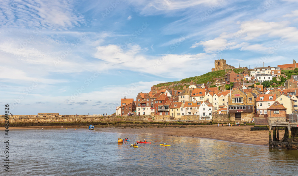 Whitby harbour and canoes.